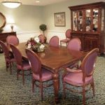 Dining room with a table and chairs.