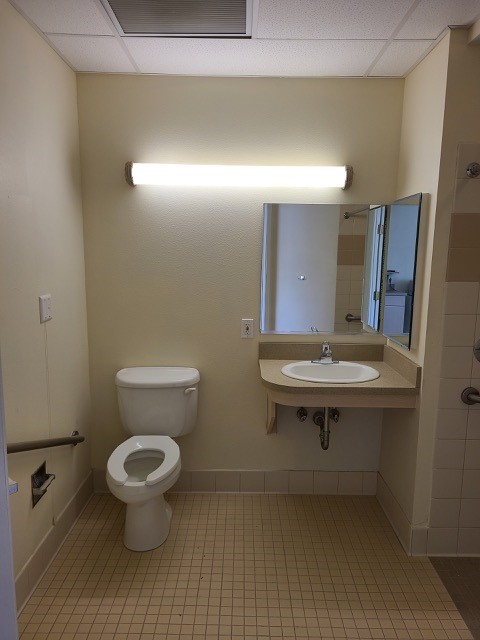 Bathroom with toilet and sink.
