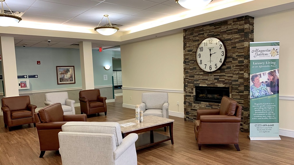 Front Lobby with chairs and a clock.